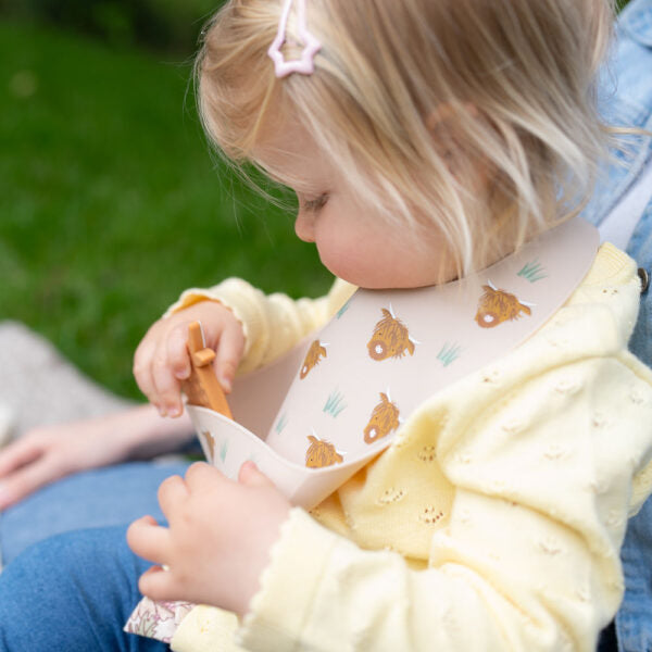 Ziggle Catch It Silicone Bib Highland Cow Pink